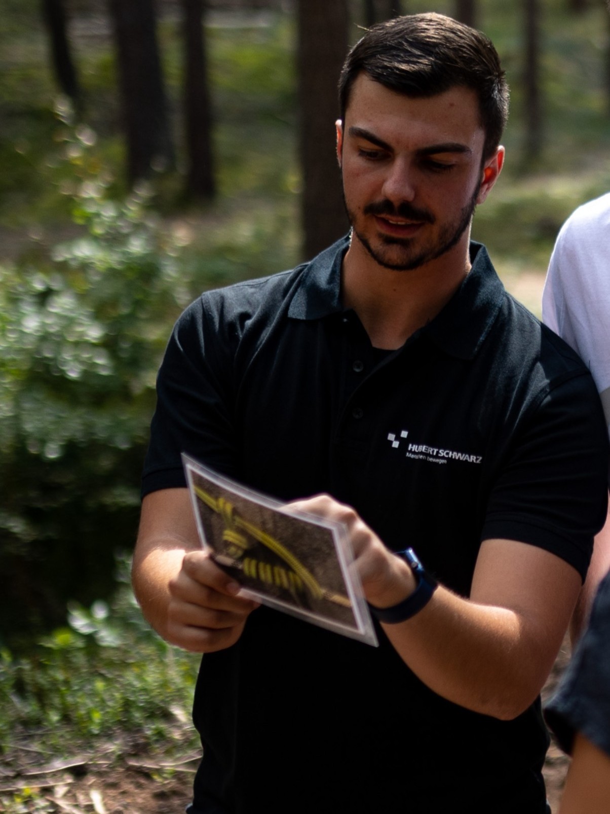 Julian Trainer Team und Outdoor im Hubert-Schwarz-Zentrum